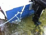 Proper placement of Sun Pump outlet hose over the transom of boat.